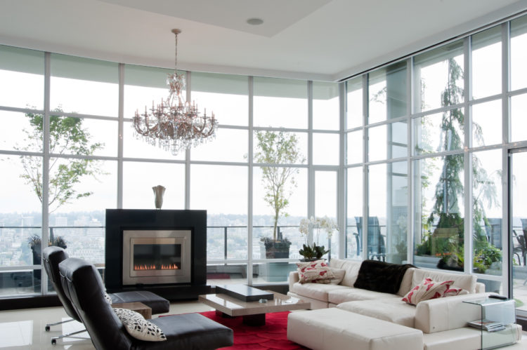 penthouse-lounge-sectional-fireplace-chandelier